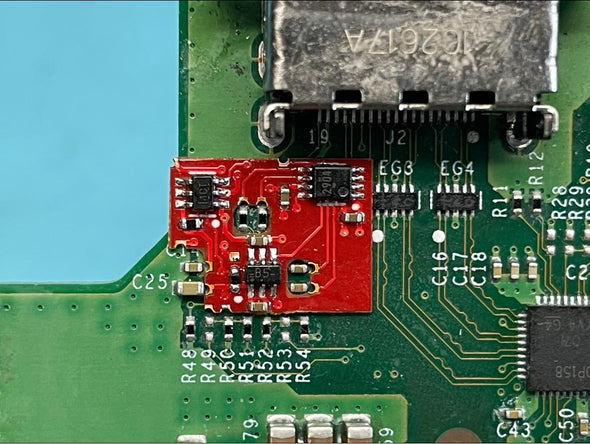 Close-up of a ShaneFix circuit-board repair